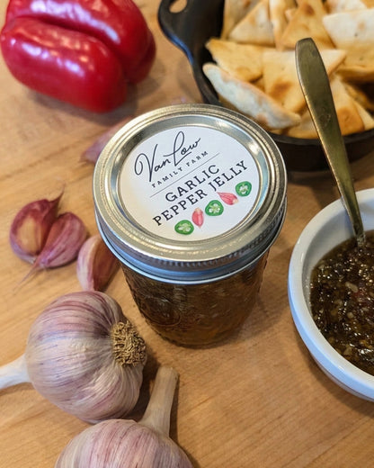 Van Low Family Farm garlic pepper jelly jar with cream cheese, pita chips, garlic, and red pepper