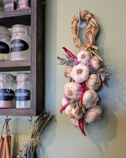Pepper and herb garlic braid hanging in a kitchen, Van Low Family Farm