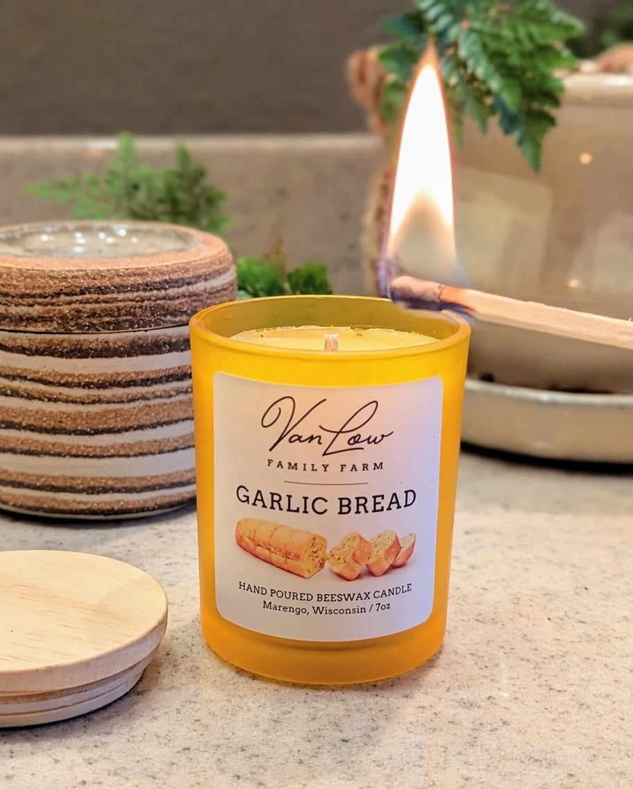 Lighting a Garlic Bread beeswax candle from Van Low Family Farm, Marengo Wisconsin